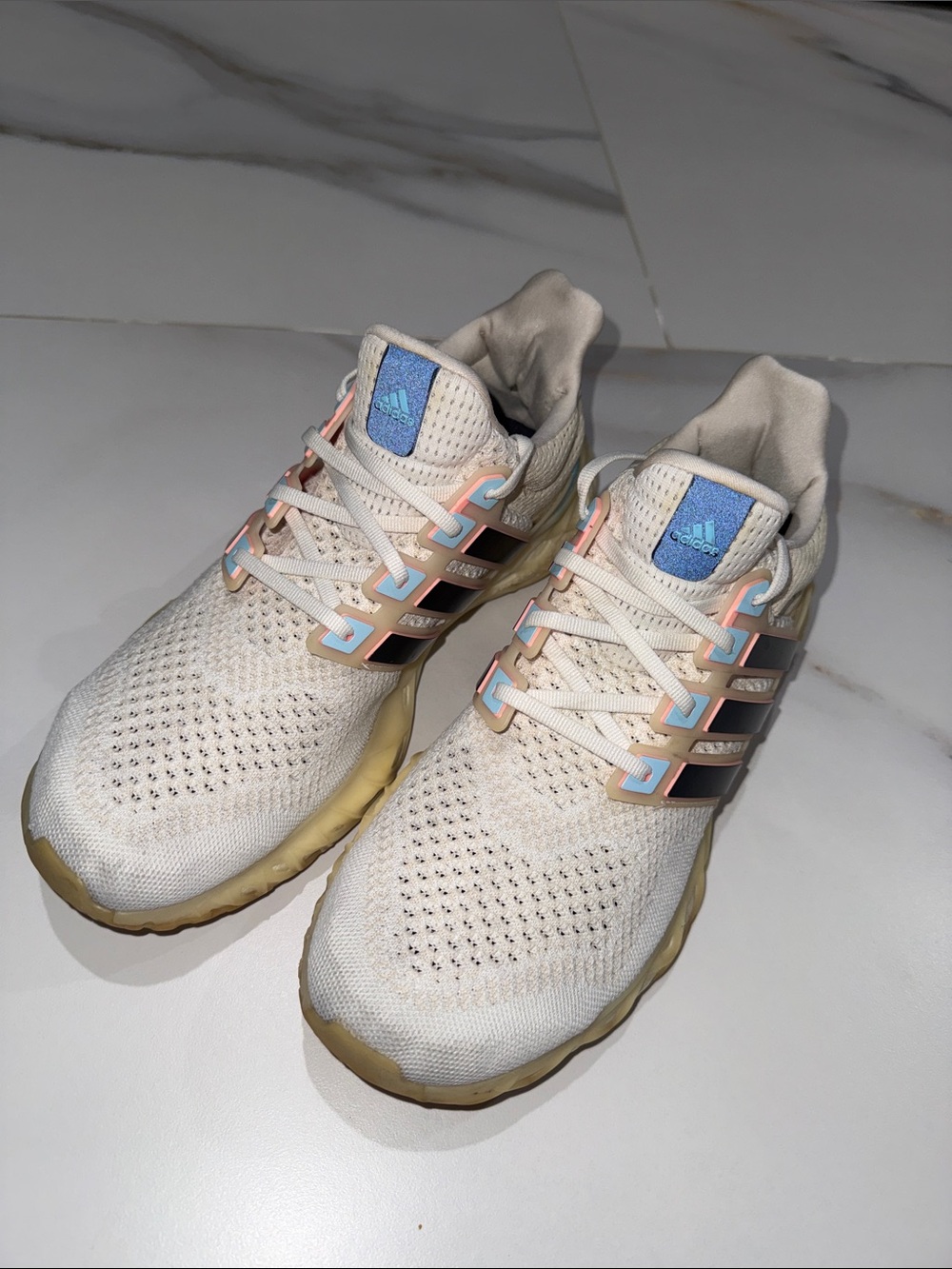adidas ✨
Cream Knit Sneakers with Pastel Pink and Blue Accents